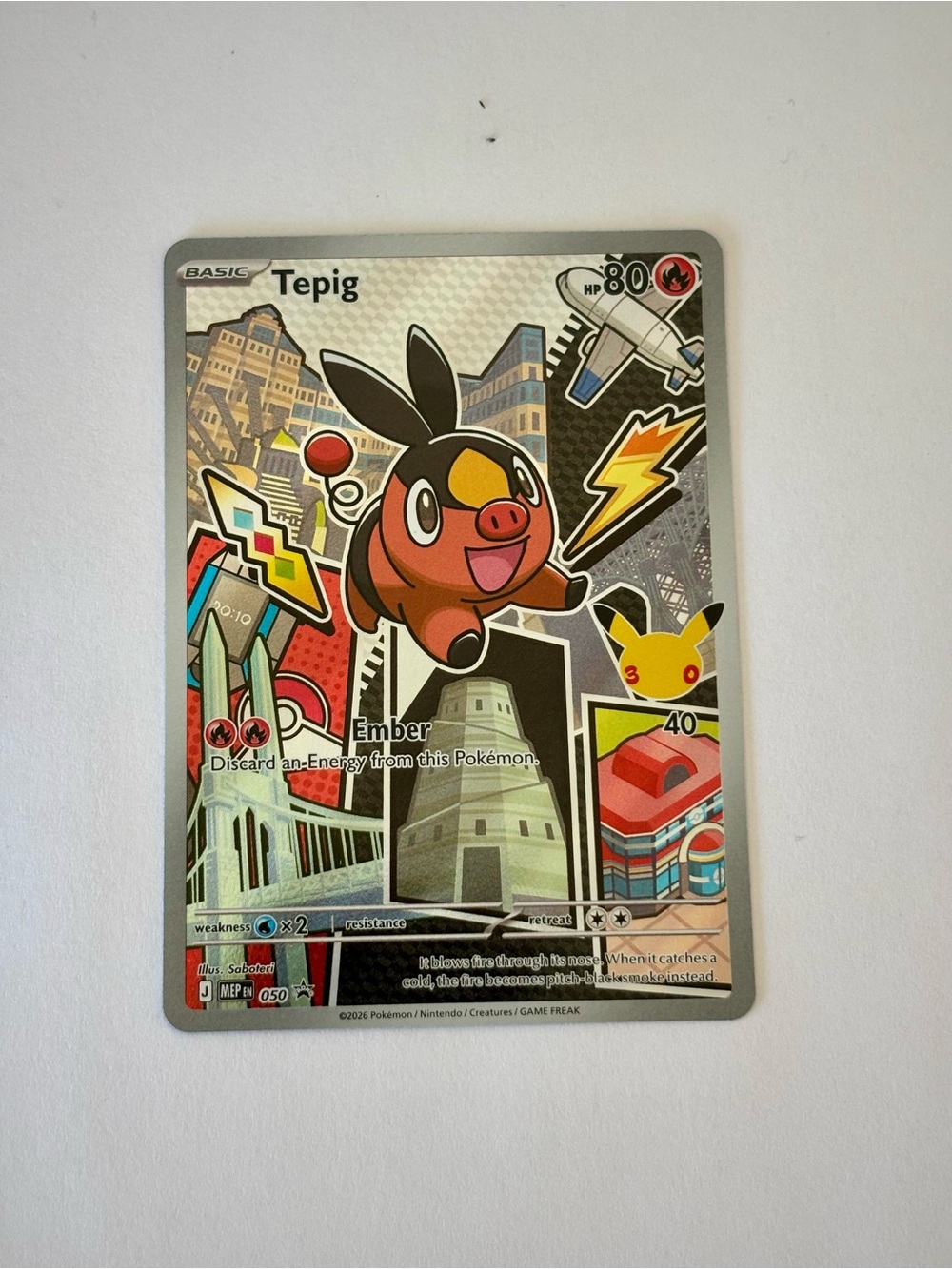 Pokemon First Partner Illustration Tepig Trading Card — red, black, yellow